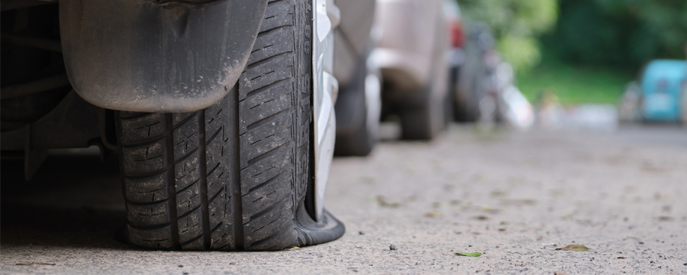 Car with a flat tire