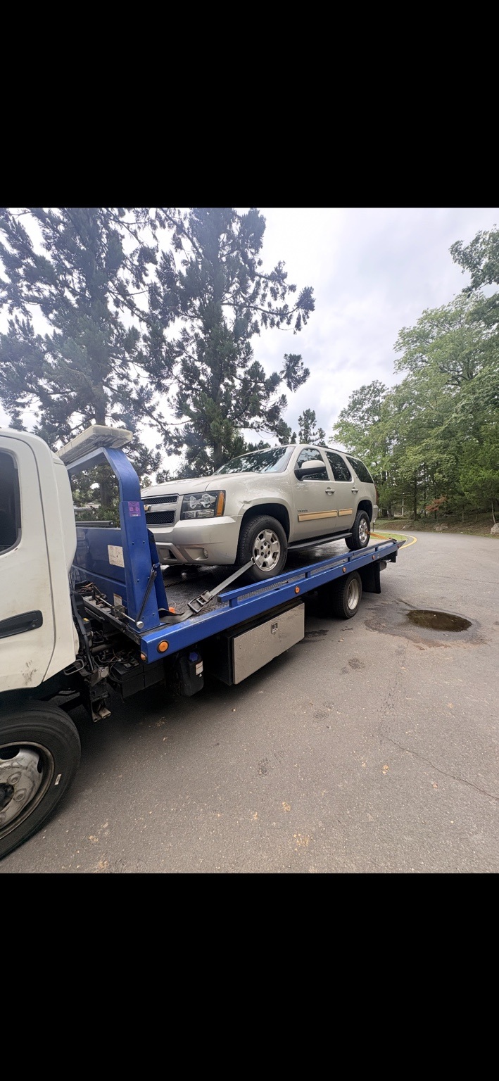 Chevrolet SUV secured on a Chain Gang flatbed after a breakdown in Princeton, New Jersey.