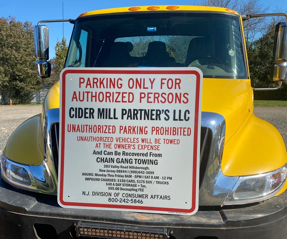 Private property sign from Chain Gang Towing and Recovery Agency 8