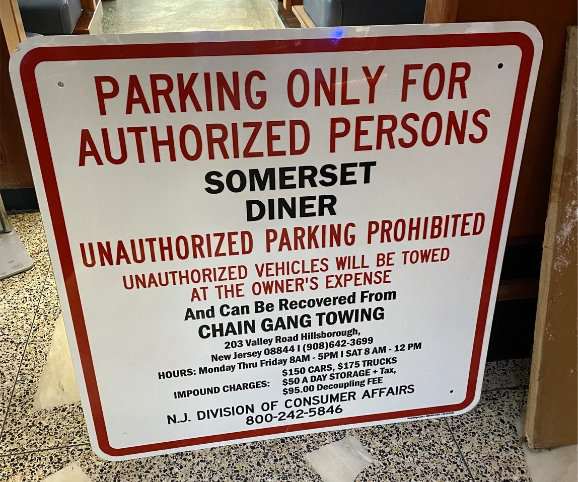 Private property sign from Chain Gang Towing and Recovery Agency 9